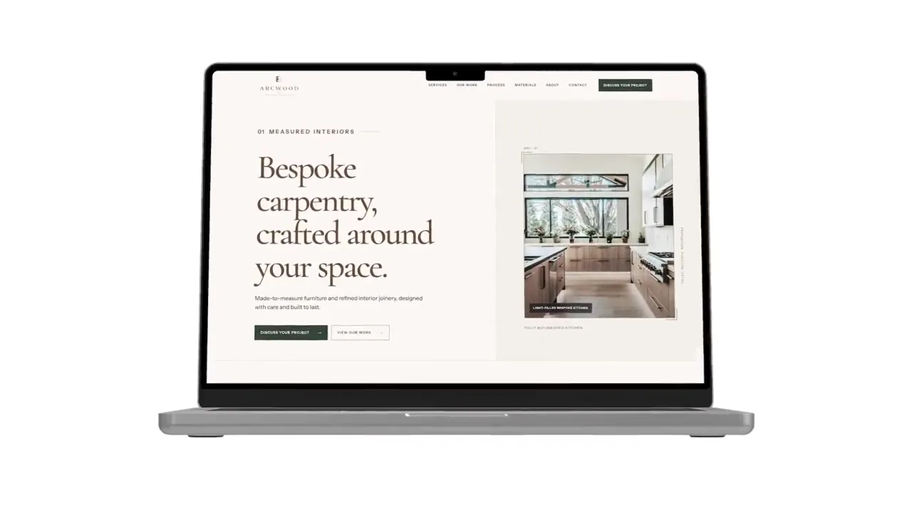 ArkWood Bespoke Carpentry website revealed on an opening MacBook